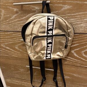 “Pink” brand Gold Mini Backpack with Black Straps